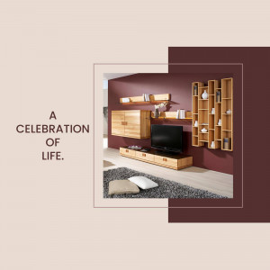 A stylish living room with a wooden entertainment center and maroon accent wall.