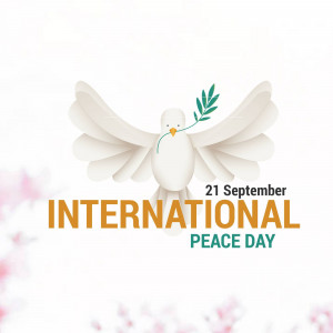 A white dove carrying an olive branch with the text 'International Peace Day - 21 September'