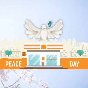 Illustration of a white dove flying over a building with the words 'Peace Day'