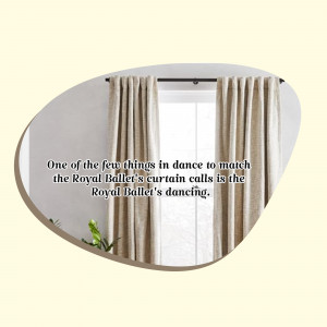 Close-up of beige curtains with a decorative frame and text overlay.