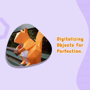 A polygonal orange squirrel holding a nut, with text 'Digitalizing Objects For Perfection.'