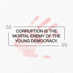 Handprint over text stating 'Corruption is the mortal enemy of the young democracy.'