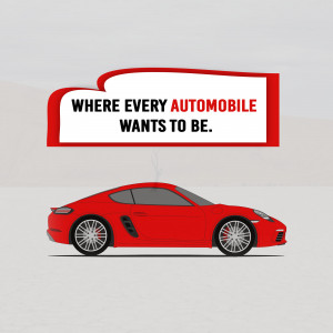 Red Porsche car with a speech bubble above it reading 'Where Every Automobile Wants To Be.'