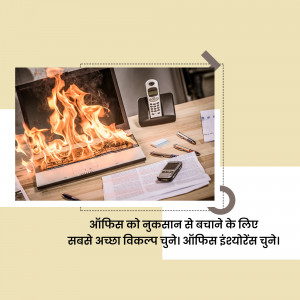 Image depicting a laptop on fire with a phone and documents, illustrating the importance of office fire safety.
