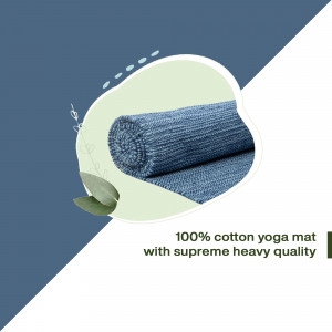 Rolled blue cotton yoga mat with green leaves and abstract shapes