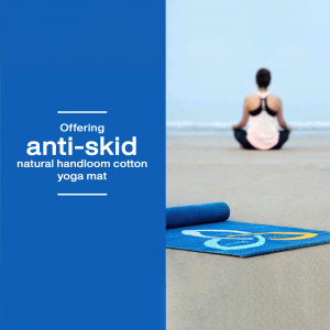 Woman meditating on a beach with an anti-skid yoga mat