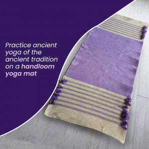 Close-up of a handloom yoga mat with purple and beige stripes.
