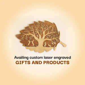 Laser engraved wooden leaf with tree and animal design