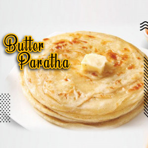 A stack of Butter Paratha with a pat of butter on top