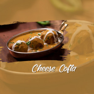 Close-up of Cheese Kofta in a creamy sauce