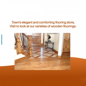 Interior view of a flooring store showcasing wooden flooring and staircase