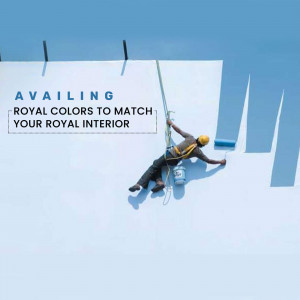 Painter working on a building exterior with the text 'Availing Royal Colors to Match Your Royal Interior'
