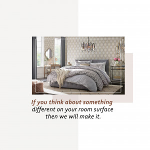 A beautifully decorated bedroom with a grey and white patterned bedspread and elegant lighting.