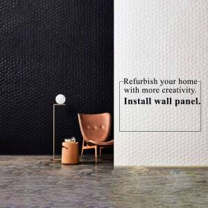 Interior design featuring a textured black wall panel, a brown armchair, and a gold floor lamp.