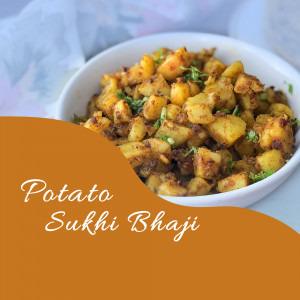 Close-up of Potato Sukhi Bhaji in a white bowl