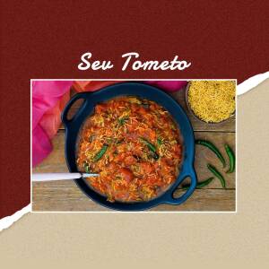 Overhead shot of Seu Tometo, a vibrant Brazilian tomato and shrimp stew in a blue bowl.