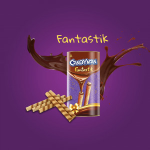 A promotional image of Fantastik Candyman chocolate with chocolate splashes and wafer sticks.
