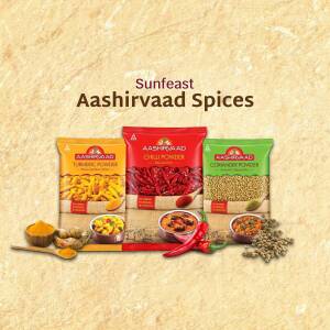 Aashirvaad Turmeric, Chili, and Coriander Powder spice packets with ingredients