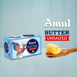 Amul Unsalted Butter packaging and a swirl of butter on a wooden spoon