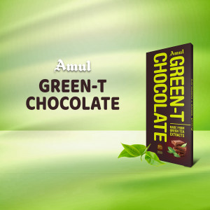 Amul Green-T Chocolate bar with green tea leaves on a green background