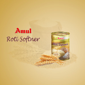 Amul Roti Softener can with wheat stalks and a cup of tea