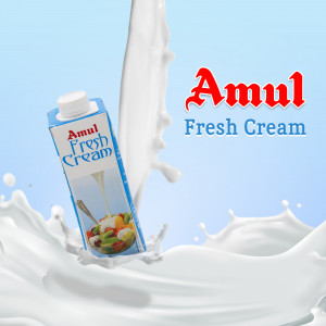 Amul Fresh Cream carton with a splash of cream and fruit salad