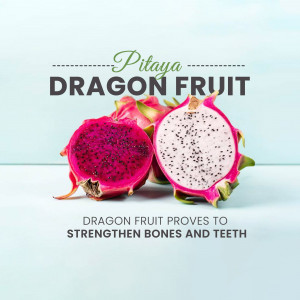 Close-up of pink dragon fruit with white speckled flesh