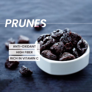 Close-up of prunes in a white bowl with text highlighting their health benefits.