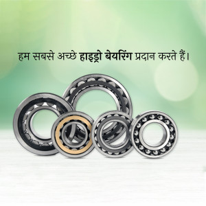 Assortment of silver ball bearings on a green background
