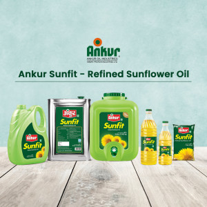 Ankur Sunfit Refined Sunflower Oil products displayed on a wooden surface