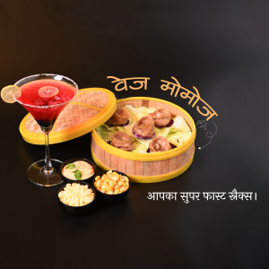 A vibrant image showcasing momos with a red cocktail and various dipping sauces.