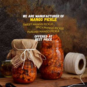 Close-up of jars of homemade mango pickle with burlap and twine, advertising manufacturer and best price.