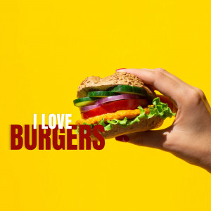 A hand holding a juicy burger with fresh ingredients against a bright yellow background with the text 'I LOVE BURGERS'.