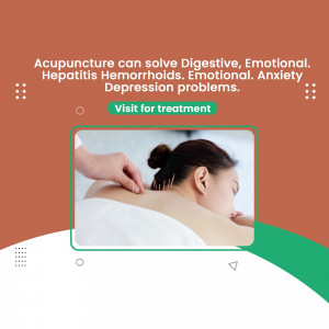 Woman receiving acupuncture treatment on her back