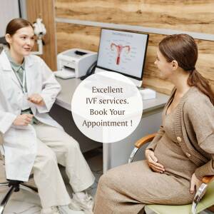 Doctor consulting with a pregnant patient about IVF treatment.