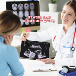 Doctor explaining ultrasound results to a patient during an IVF consultation.