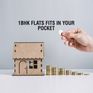 Wooden house model with coins representing affordable housing
