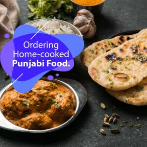 A delicious spread of Punjabi cuisine including butter chicken, naan, and rice.