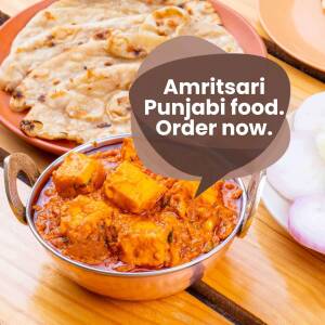 Close-up of Amritsari Punjabi food - Paneer Tikka Masala and Roti