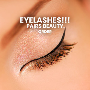 Close-up of an eye with dramatic eyelash extensions and eyeliner.