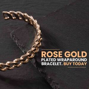 Close-up of a rose gold plated wrap bracelet on a dark background