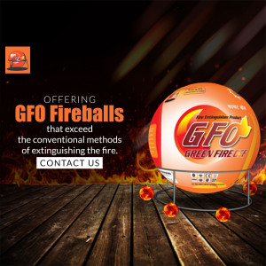 GFO Fireball fire extinguisher product shot on a wooden surface with flames in the background.