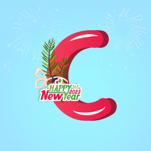 Red letter C decorated with pine branches and a 'Happy New Year 2023' banner, with fireworks in the background.