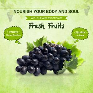 Close-up of a bunch of dark grapes with green leaves, promoting fresh fruit.