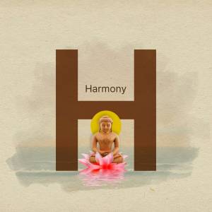 Letter H with a meditating Buddha statue on a lotus flower