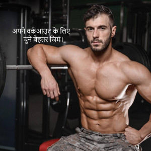 A muscular man sitting in a gym, tearing a shirt to reveal his physique.