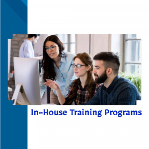 Team collaborating on a computer during in-house training