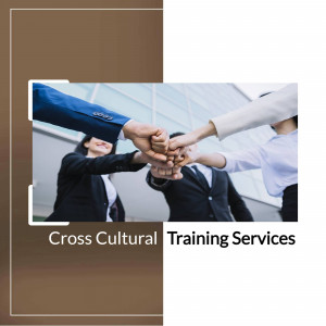 Group of diverse professionals joining hands in a team building exercise.