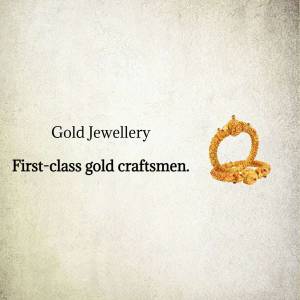 Close-up of a beautifully crafted gold ring with intricate details.