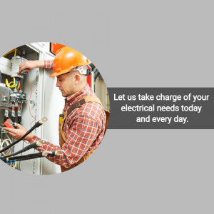 Electrician working on electrical panel with safety gear